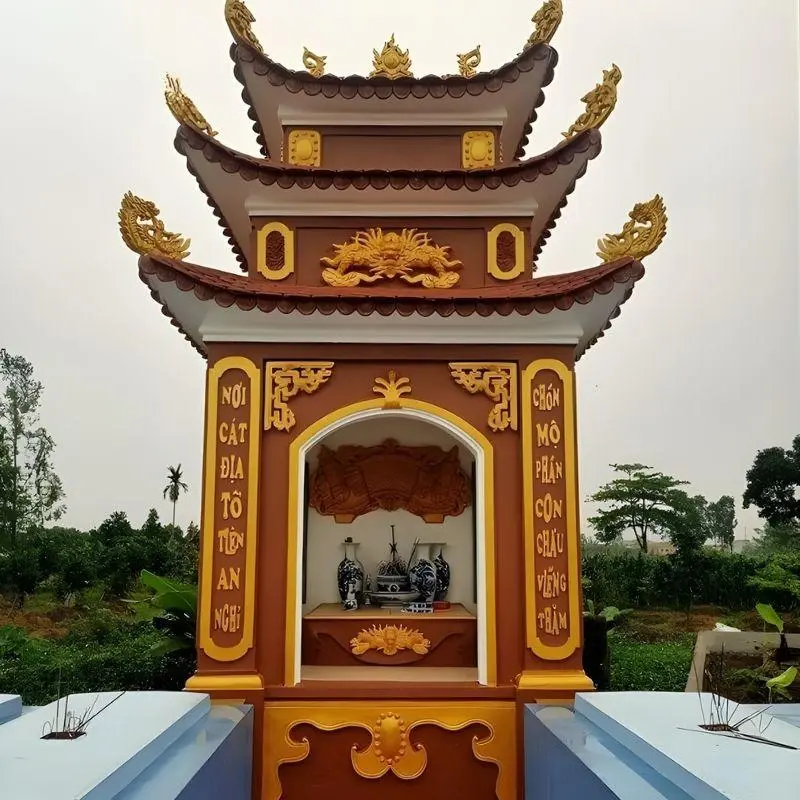 Mẫu lăng mộ đỏ phối màu vàng cùng hoa văn chạm nổi đẹp (Nguồn: Internet)