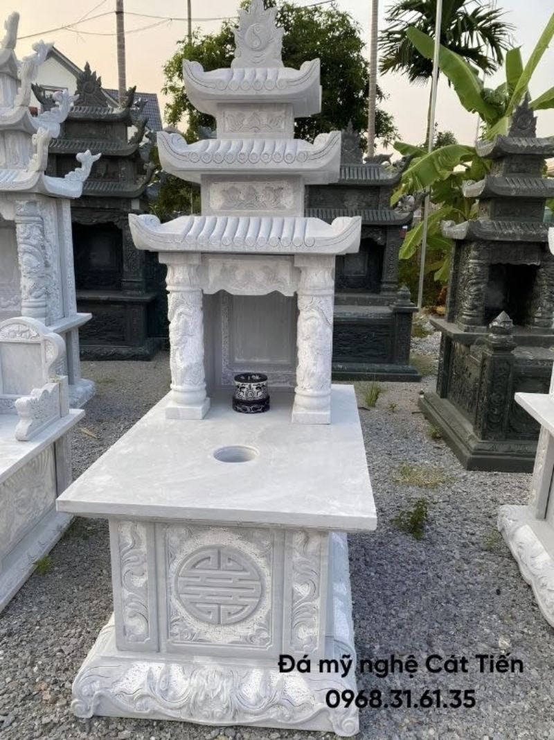 Mộ 3 mái đá trắng hoa văn chữ, rồng phượng kích thước 127 cm × 232cm giá 30.000.000 VND