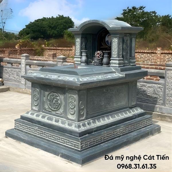 Mẫu mộ đá mái vòm xanh rêu đậm nguyên khối hoa văn đơn giản kích thước 60cm x 81cm giá 27 triệu.